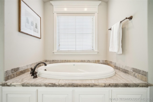 bathroom featuring a garden tub
