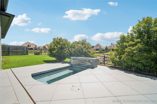 view of pool featuring a patio, a fenced backyard, a jacuzzi, a yard, and a residential view