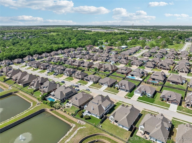 aerial view featuring a water view and a residential view