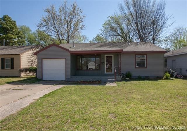 ranch-style home with an attached garage, a front lawn, covered porch, and concrete driveway