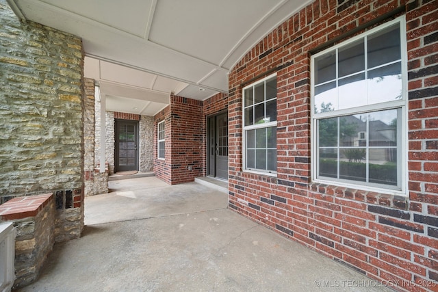 8655 E 103rd St, Tulsa, OK 74133 - view of patio featuring a porch
