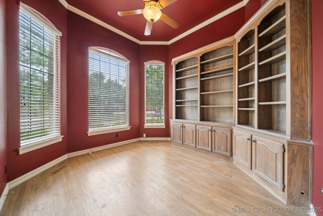 8655 E 103rd St, Tulsa, OK 74133 - spare room with baseboards, plenty of natural light, crown molding, light wood-style floors, and ceiling fan