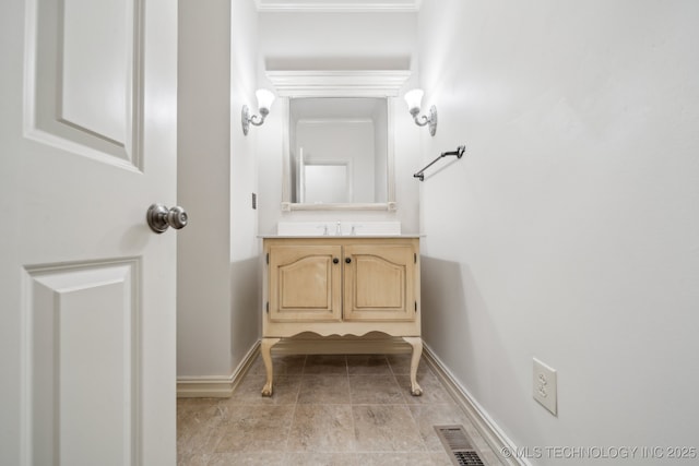 8655 E 103rd St, Tulsa, OK 74133 - bathroom featuring baseboards and vanity