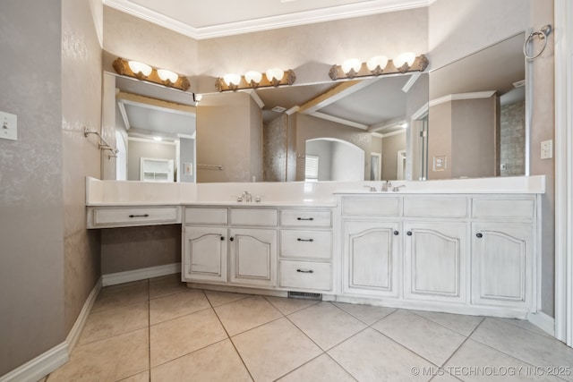 8655 E 103rd St, Tulsa, OK 74133 - bathroom with ornamental molding, tile patterned flooring, double vanity, and baseboards