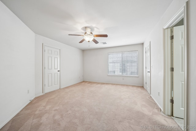 8655 E 103rd St, Tulsa, OK 74133 - empty room with a ceiling fan, light colored carpet, and baseboards