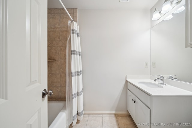 8655 E 103rd St, Tulsa, OK 74133 - bathroom featuring tile patterned flooring, vanity, and shower / bath combo with shower curtain