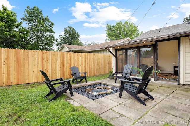 view of patio featuring fence