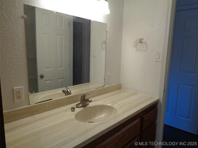 177 Lakeaire Dr, Eufaula, OK 74432 - bathroom with vanity and a textured wall