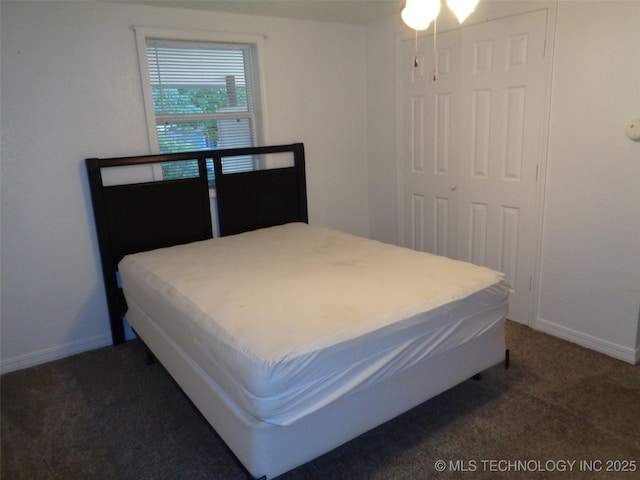177 Lakeaire Dr, Eufaula, OK 74432 - carpeted bedroom with baseboards and a closet