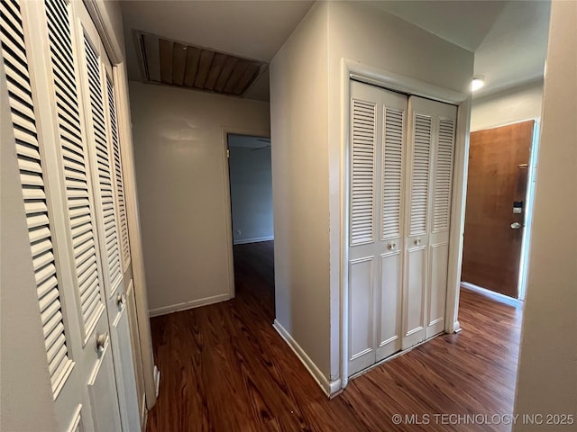 12131 E 31st Pl, Tulsa, OK 74146 - corridor with dark wood-style floors and baseboards