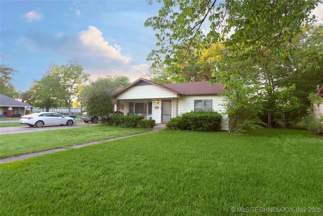view of front of house with a front lawn