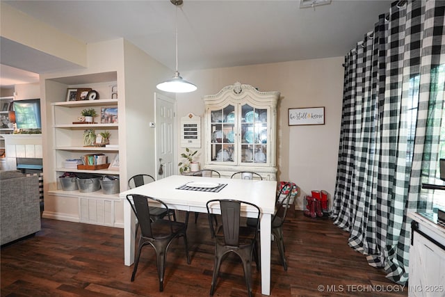 13367 S 254th E Ave, Coweta, OK 74429 - dining area featuring built in features, dark wood finished floors, and a tile fireplace
