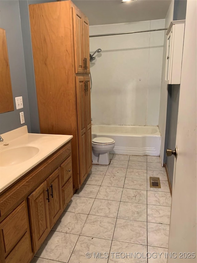 bathroom featuring vanity, visible vents, toilet, and shower / washtub combination