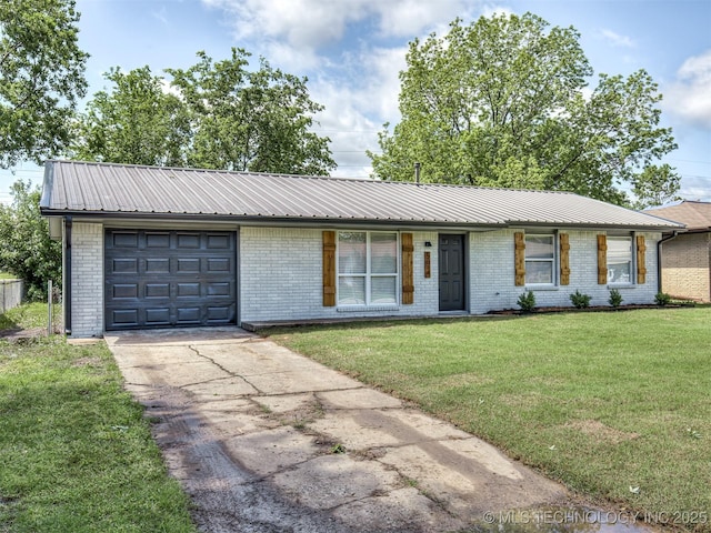 single story home featuring a garage, driveway, metal roof, and brick siding