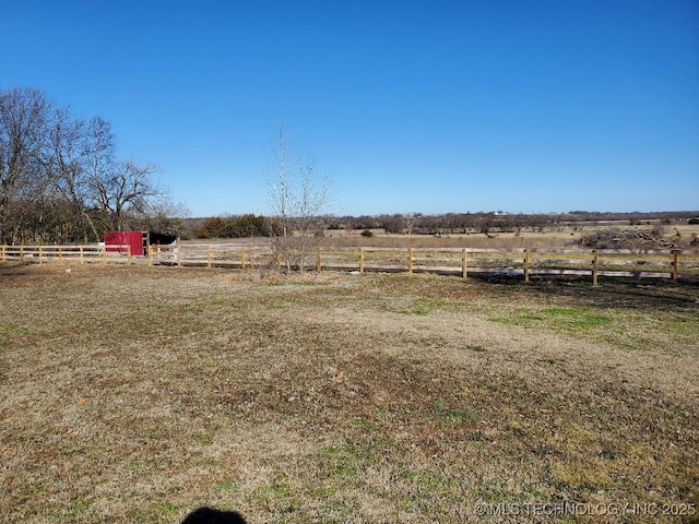 824 W Houston St, Okemah, OK 74859 - view of yard featuring a view of countryside and an outdoor structure