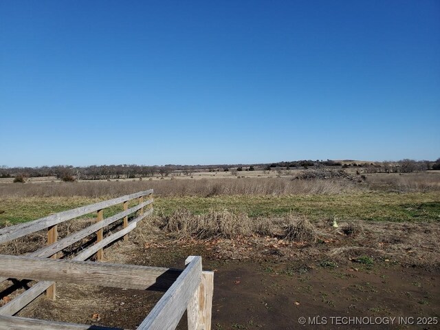 824 W Houston St, Okemah, OK 74859 - view of yard with a rural view