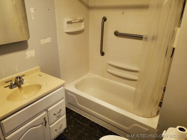 824 W Houston St, Okemah, OK 74859 - full bathroom featuring vanity, toilet, shower / bathtub combination with curtain, and marble finish floors
