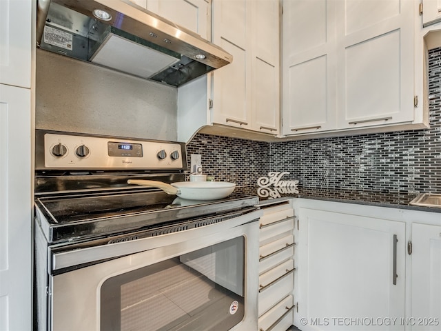 2236 S Marion Ave, Tulsa, OK 74114 - kitchen featuring stainless steel electric range, dark countertops, exhaust hood, and backsplash