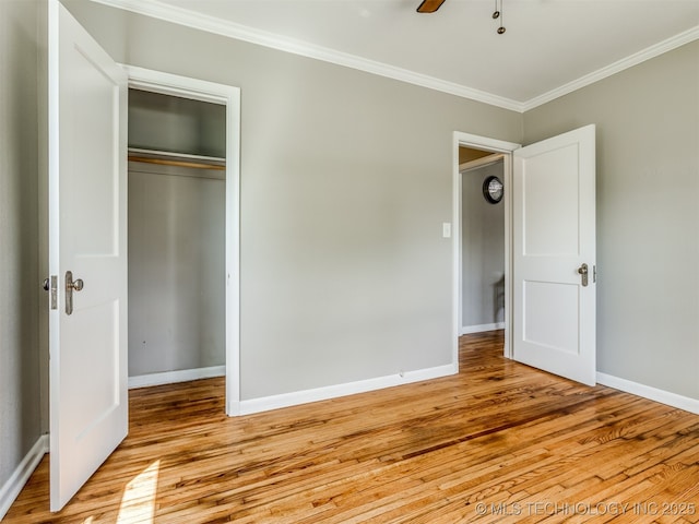 2236 S Marion Ave, Tulsa, OK 74114 - unfurnished bedroom with light wood finished floors, ornamental molding, baseboards, and a closet