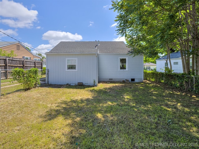 2236 S Marion Ave, Tulsa, OK 74114 - back of property with a lawn, a fenced backyard, and crawl space
