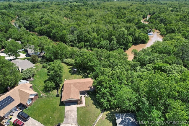 bird's eye view with a view of trees