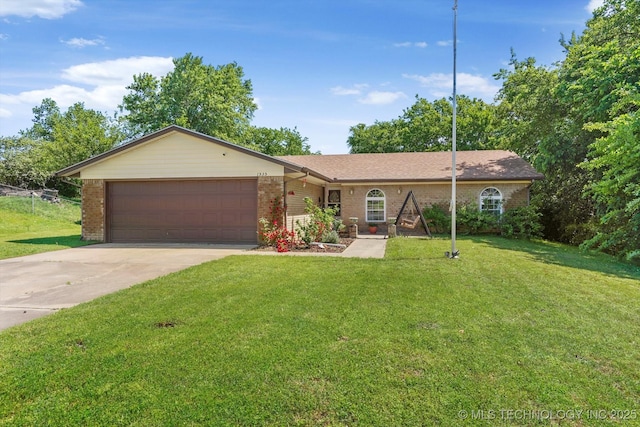 ranch-style home featuring an attached garage, driveway, a front lawn, and brick siding