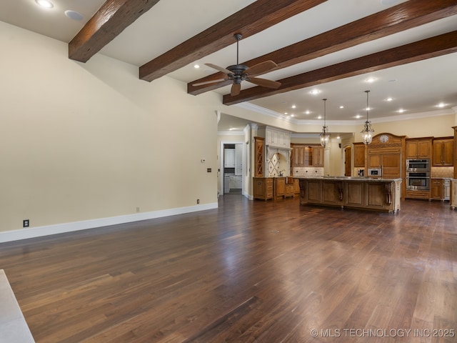 unfurnished living room featuring dark wood-style flooring, ceiling fan, beamed ceiling, and ornamental molding