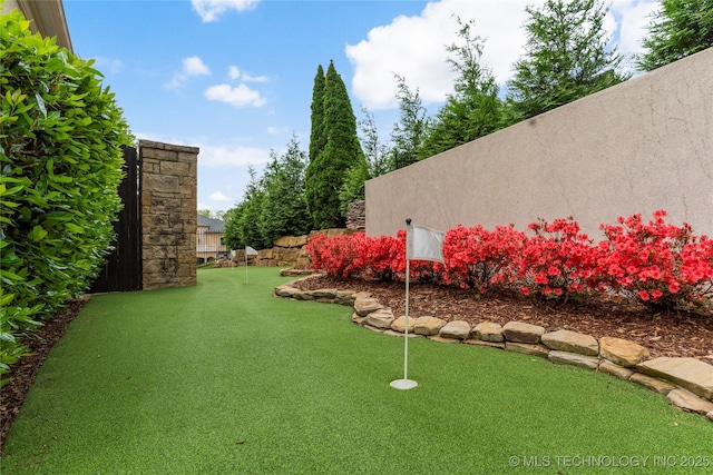 10910 S 69th E Ave, Tulsa, OK 74133 - view of yard with an area to practice putting