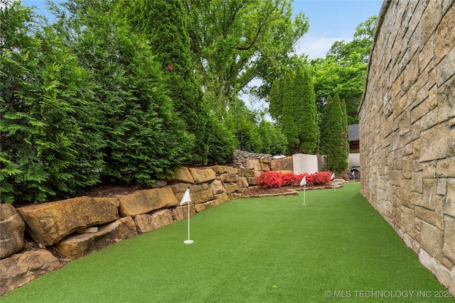 10910 S 69th E Ave, Tulsa, OK 74133 - view of yard with an area to practice putting