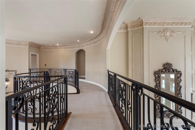 10910 S 69th E Ave, Tulsa, OK 74133 - hall with an upstairs landing, arched walkways, ornamental molding, and recessed lighting