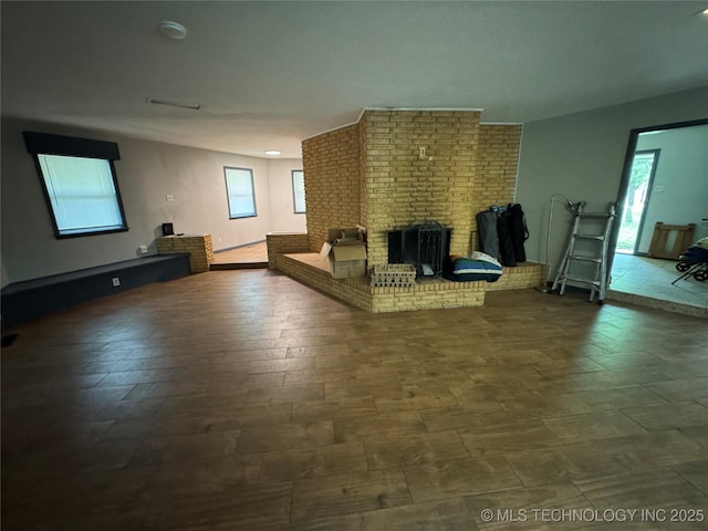unfurnished living room with a fireplace