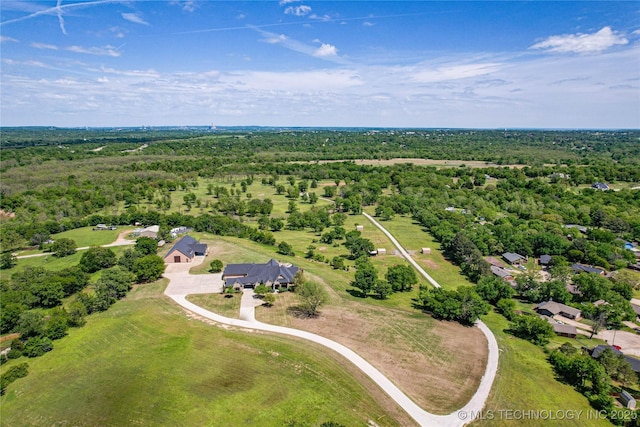 aerial view with a wooded view