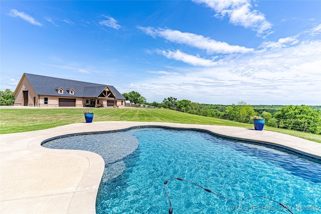 pool featuring a lawn