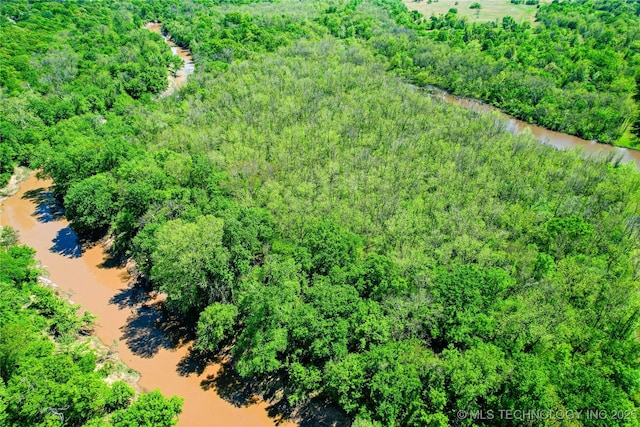 aerial view featuring a forest view