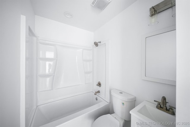 full bath featuring toilet, visible vents, tub / shower combination, and a sink