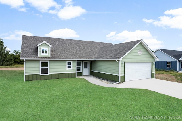 single story home with a shingled roof, an attached garage, concrete driveway, and a front yard