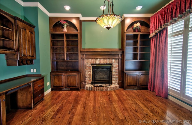 unfurnished living room featuring crown molding, a fireplace, recessed lighting, baseboards, and wood finished floors