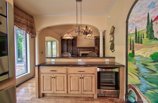 bar with arched walkways, decorative columns, ornamental molding, and beverage cooler