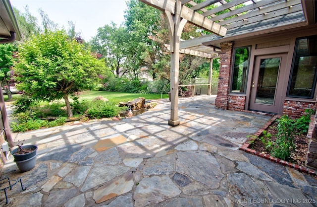 view of patio / terrace featuring a pergola