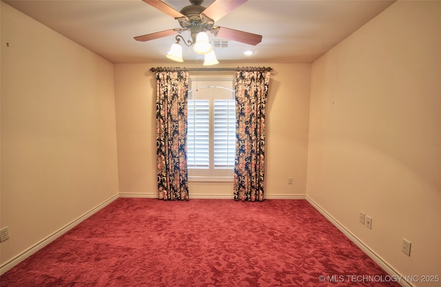 unfurnished room with baseboards, carpet, and a ceiling fan