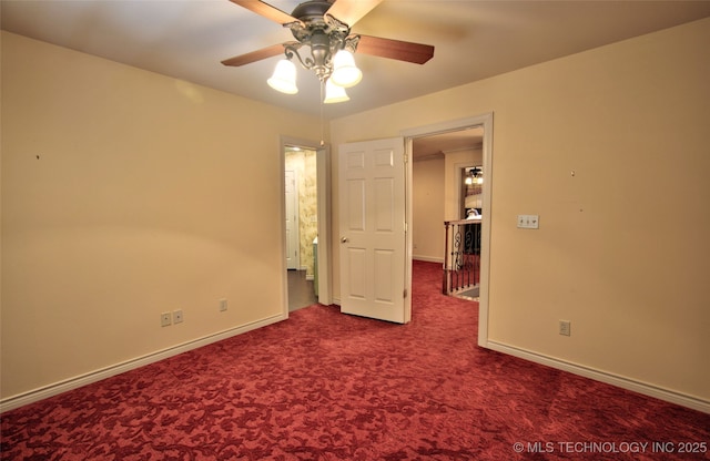 empty room with baseboards, a ceiling fan, and carpet flooring