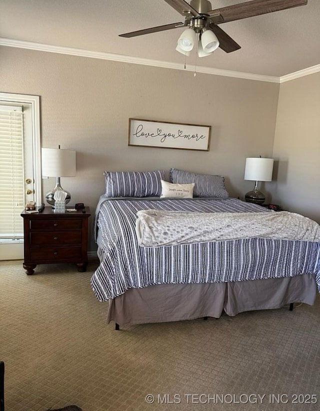 carpeted bedroom with ceiling fan and ornamental molding