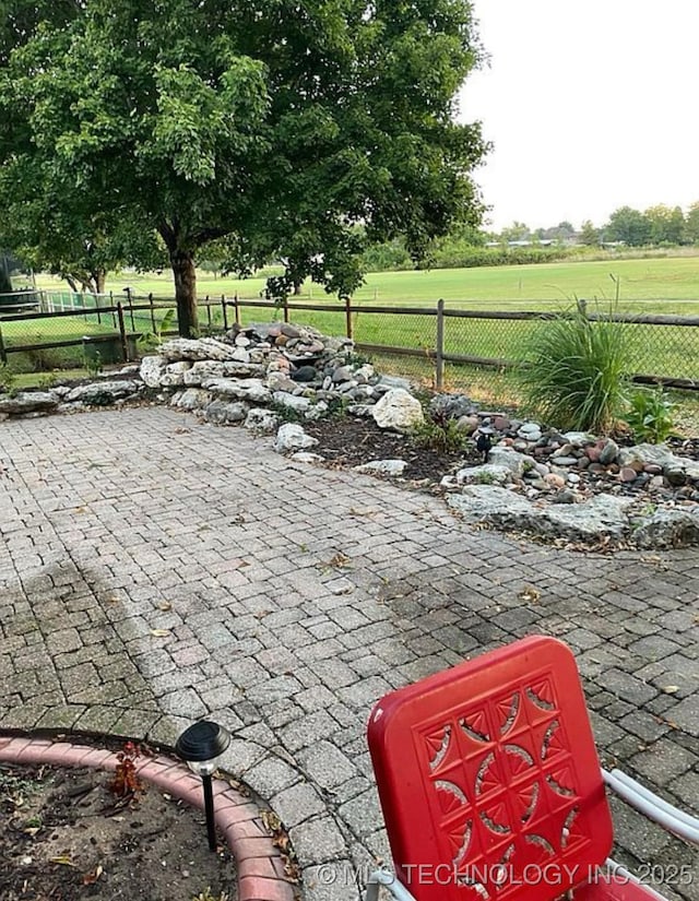 view of patio / terrace with fence