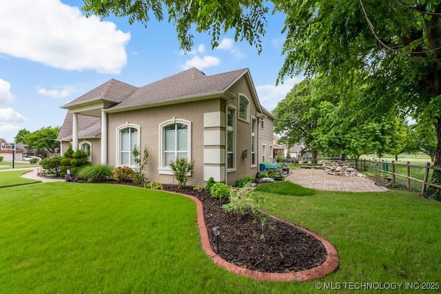 3401 N Narcissus Ave, Broken Arrow, OK 74012 - view of property exterior featuring a patio area, brick siding, and roof with shingles