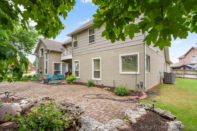 3401 N Narcissus Ave, Broken Arrow, OK 74012 - back of property with central AC unit, a patio, a balcony, and brick siding
