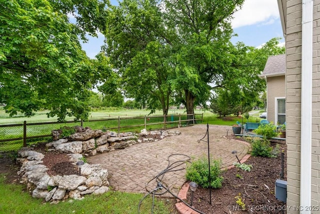 3401 N Narcissus Ave, Broken Arrow, OK 74012 - view of yard featuring fence and a patio area