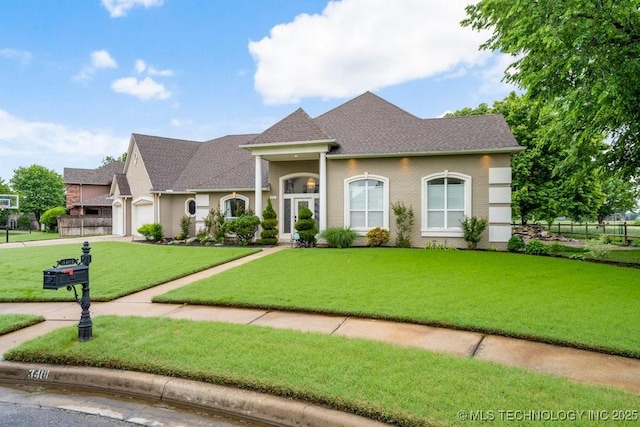 3401 N Narcissus Ave, Broken Arrow, OK 74012 - view of front of house with a front yard, concrete driveway, a garage, and a shingled roof