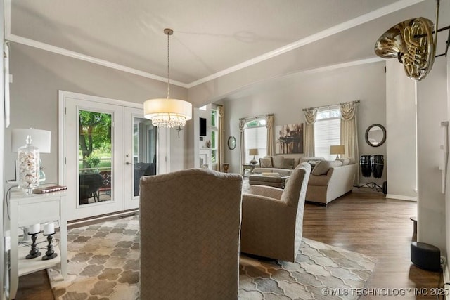 3401 N Narcissus Ave, Broken Arrow, OK 74012 - dining space with a chandelier, wood finished floors, crown molding, and baseboards