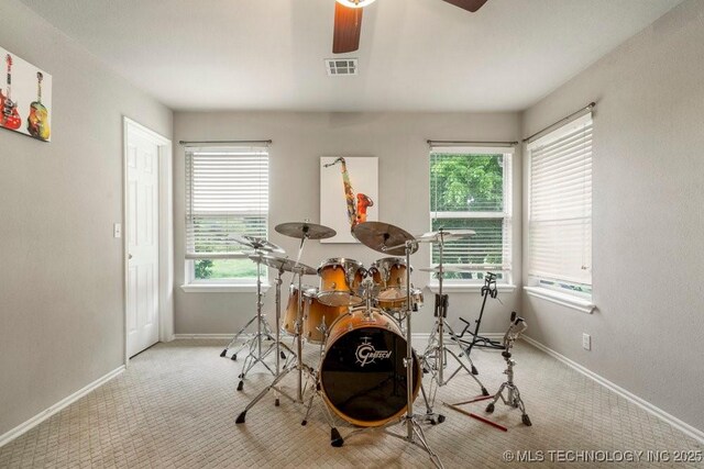 3401 N Narcissus Ave, Broken Arrow, OK 74012 - dining room with carpet floors, a ceiling fan, and baseboards