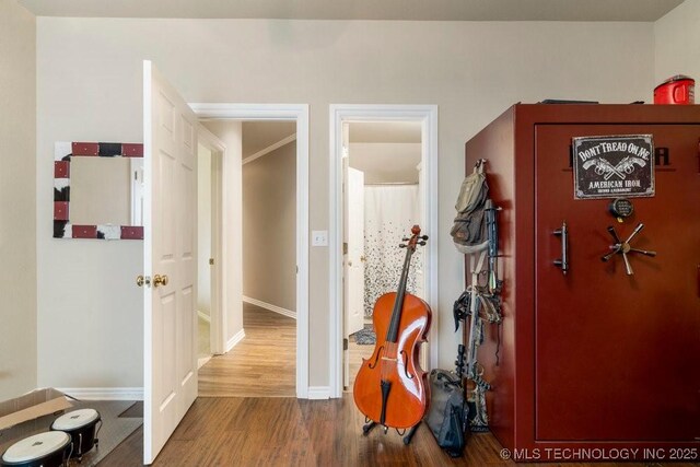 3401 N Narcissus Ave, Broken Arrow, OK 74012 - corridor with wood finished floors and baseboards